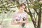 Romance woman holds bouquet of pink peonies. Bridesmade, bride