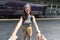 Romance young Asian woman holding boyfriend hands follow her at train station. Romantic and travel in summer vacation concept