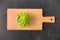 Romanesco broccoli on wooden cutting board