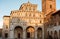 Romanesque Facade and bell tower of St. Martin Cathedral in Lucca, Tuscany.