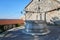 Romanesque House and Rainwater Drains and a Stone Fountain in Stanjel Slovenia
