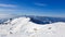 Romania, Bucegi Mountains, Viewpoint from Omu Peak to Piatra Craiului Mountains and Iezer&Papusa Mountains.