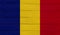 Romania flag on a wooden texture.