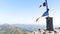 Romania flags on top of the mountains in summer time