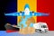 Romania logistics concept illustration. National flag of Romania from the back of globe, airplane, truck and cargo container ship