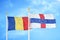 Romania and Netherlands Antilles two flags on flagpoles and blue sky