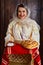 Romania in an old traditional bride costume offering bread and salt