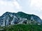 Romania, Piatra Craiului Mountains, La Om Peak. The Black Goat on the peak.