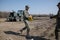 Romanian Army soldiers measure the ground for a campaign mobile hospital ROL 2 to treat Covid-19 patients