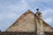 Romanian ceramic shingle roof with brick chimney