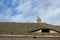 Romanian ceramic shingle roof with brick chimney