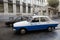 Romanian Dacia cars, one black used by the former communist Securitate and one used by the former Militia police