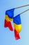 Romanian Flag in the sun, National Day of Romania, blue sky