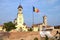 The Romanian flag waving between the Orthodox Coronation Cathedral and St. Michael Roman Catholic Cathedral in Carolina Citadel o