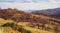 Romanian old sheepfold on the hill in the fall season