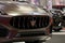 Romaniaâ€“2022-Front-side view with detail of a luxury sports brown car Maseratti Levante,premium car.