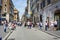Romans and tourists strolling along the famous Via del Corso shopping street in Rome