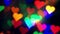 Romantic abstract background. flashing bokeh lights in the form of multi-colored hearts.