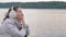 Romantic affecting mood autumn woman on lake background portrait
