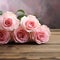 Romantic allure Pink roses on rustic board, vintage festivity