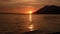 Romantic and amazing Sunset at the sea. Sun going down over horizon. Beautiful sunset over the sea. Croatian coast and Adriatic s
