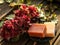 Romantic autumnal still life of flowers and soaps