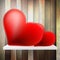 Romantic background with hearts on wood shelf.