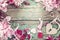 Romantic background with pink peonies, lock-heart and key in the