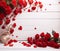 romantic background with red flowers and hearts and white wooden table floor