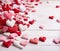 romantic background with red, pink and white hearts and white wooden table floor