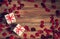 Romantic Background with rose petals and presents for two