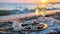 Romantic beach picnic couple enjoying sunset with oysters and sparkling wine by the sea