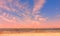 Romantic beautiful sunset afternoon at sea people  silhouette on horizon  Baltic Sea seashell on the rock  sea sky