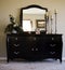 romantic bedroom with mirror on dresser