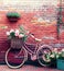 Romantic Bike with Colorful Wild Flower Basket Leaning on the Wall- Generated Artificial Intelligence -AI