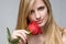 Romantic blond with red rose.