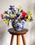 Romantic bouquet of garden flowers in a decorative ceramic vase