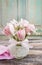 Romantic bouquet of pink tulips and gypsophilia paniculata