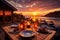 Romantic candlelit dinner on the beach at sunset sky in a luxury resort with breathtaking sea view