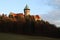 Romantic castle - fortress with tower in the forest. Smolenice castle, Congress Center of SAS - built in 15th century