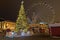 Romantic Christmas market with New Year Tree in Kyiv, Ukraine. The Ferris wheel and Christmas decoration at the Kontraktova Square