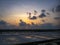 Romantic clouds gathering at colorful evening near saltpan