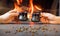 Romantic coffee break. A couple drinks coffee from ceramic coffee cups against a backdrop of burning fire and coffee beans. Close-