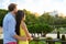 Romantic couple embracing enjoying view in park