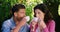 Romantic couple having tea in park