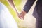 Romantic couple holding hands. Lovers or newlywed married young couple in romance. wedding theme