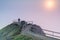 Romantic couple hugging in foggy sunset Muir Beach Overlook.