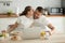 Romantic couple kiss enjoying delicious healthy breakfast at hom