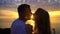 Romantic Couple Kiss at Sunset