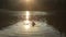 Romantic couple kiss in the water on a background sunset. Beautiful mountain lake Synevir